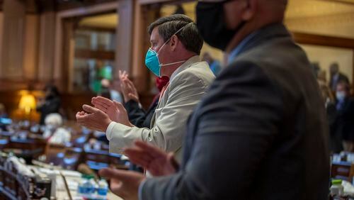 Members of the Georgia House of Representatives wear masks in June, when the 2020 legislative session resumed after being suspended in March as a caution against COVID-19. (ALYSSA POINTER / ALYSSA.POINTER@AJC.COM)