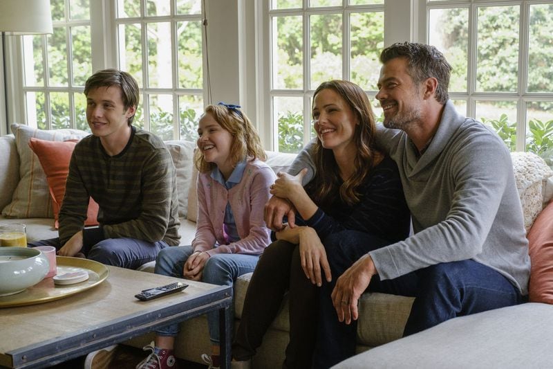 Nick Robinson (left) stars as Simon, and Talitha Bateman, Jennifer Garner and Josh Duhamel play his family in “Love, Simon.” CONTRIBUTED BY BEN ROTHSTEIN / TWENTIETH CENTURY FOX