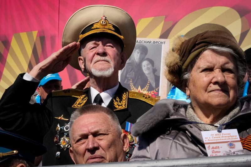 Veterans watch the Victory Day military parade at the Palace Square in St. Petersburg, Russia, Thursday, May 9, 2024, marking the 79th anniversary of the end of World War II. (AP Photo/Dmitri Lovetsky)