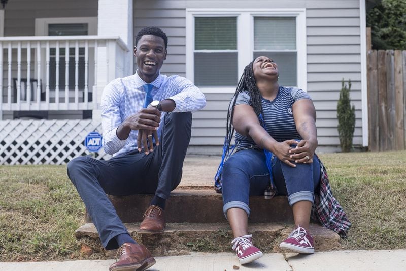 Carver S.T.E.A.M. student China Monae Bailey, right, speaks with her mentor and neighbor Aaron Doctor outside of their houses in Atlanta’s Capital View neighborhood, Wednesday, Sept. 26, 2018. Doctor, originally from South Carolina, is a fourth year Medical Student at Morehouse School of Medicine. Bailey aspires to become a nurse. “I want to be a resource for bright young aspiring health professionals,” Doctor said. (ALYSSA POINTER/ALYSSA.POINTER@AJC.COM)
