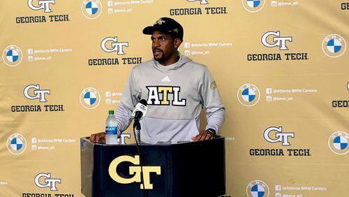 Georgia Tech wide receivers coach Kerry Dixon speaks with media after a preseason practice Aug. 17, 2021. Dixon was hired by the Baltimore Ravens as assistant quarterbacks coach on March 28, 2022. (AJC photo by Ken Sugiura)