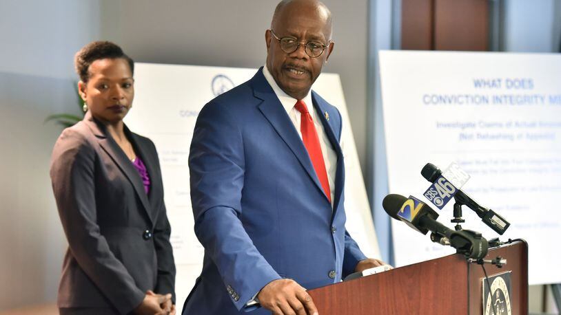 Fulton County District Attorney Paul Howard speaks as Melissa Redmon (left), a University of Georgia School of Law professor, listens during a news conference to announce the creation of a Conviction Integrity Unit at the Fulton County district attorney’s office on Tuesday, May 7, 2019. Redmon will serve as a consultant to the Conviction Integrity Unit.