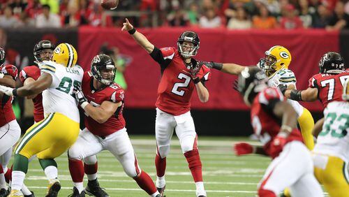 October 30, 2016 ATLANTA: Matt Ryan completes a pass under pressure from the Packers during the first half in an NFL football game on Sunday, Oct. 30, 2016, in Atlanta. Curtis Compton /ccompton@ajc.com