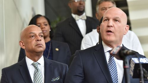 May 12, 2017 Decatur - DeKalb County Sheriff Jeffrey Mann (left) stands next to his attorney Noah Pines as he speaks for Sheriff Jeffrey Mann during a press conference at DeKalb County Sheriff Office on Friday, May 12, 2017. DeKalb County Sheriff Jeffrey Mann, speaking through his lawyer, apologized to his constituents on Friday and said he plans to continue serve in his job. HYOSUB SHIN / HSHIN@AJC.COM