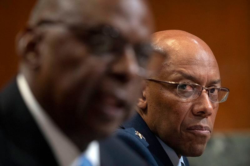 Chairman of the Joint Chiefs of Staff Air Force Gen. CQ Brown, right, listens as Secretary of Defense Lloyd Austin, left, speaks during a hearing of the Senate Appropriations Committee Subcommittee on Defense on Capitol Hill, Wednesday, May 8, 2024, in Washington. (AP Photo/Mark Schiefelbein)