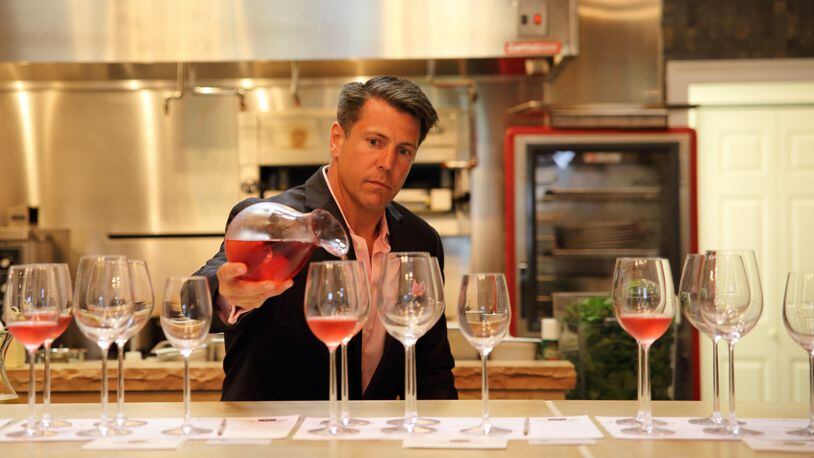 JW Ray, CEO and winemaker at JOLO Vineyards in Pilot Mountain, North Carolina, oversees a rosé tasting. 
(Courtesy of Surry County Tourism)