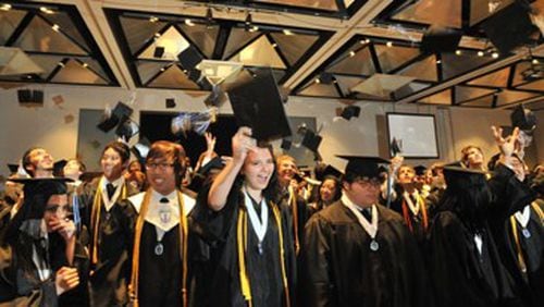 The four-year graduation rate for Gwinnett County Public Schools dipped slightly in 2019 from the previous year. District officials point out that five-year graduation rate rose and Gwinnett graduates surpassed the national average in college graduation. AJC file photo