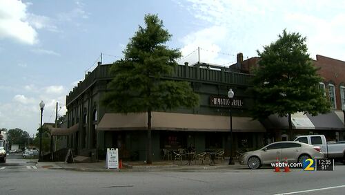 Multiple people were injured after an air duct system fell through the ceiling of the Mystic Grill restaurant, known for being featured on the television series "The Vampire Diaries." The restaurant reopened Tuesday.