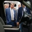 Gov. Brian Kemp looks inside of a Rivian electric vehicle following a press conference celebrating the first ever Rivian Day at the Georgia State Capitol on Wednesday, March 1,  2023. (Natrice Miller/ Natrice.miller@ajc.com)