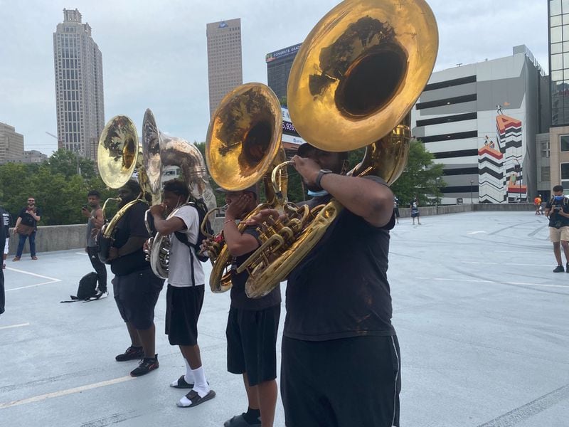 A group of young African American men and women who are band members at various historically black colleges and universities gathered for a jam session atop a parking deck in Atlanta on Saturday, June 6, 2020. (Photo: Eric Stirgus / AJC)