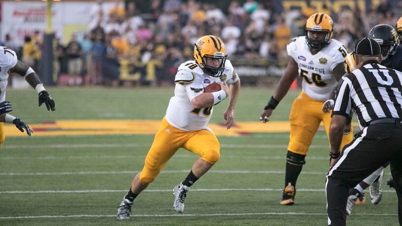 Kennesaw State’s Trey White runs through an opening. Photo by Collin Brooks