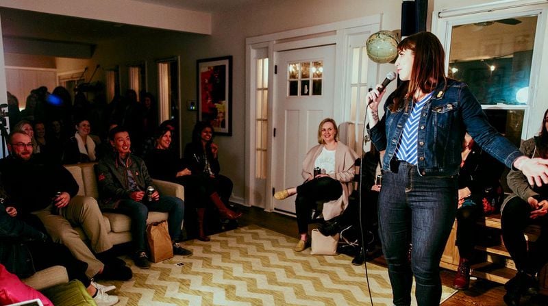 Comedian Sam Gordon performs a living room show in Atlanta’s West End for Don’t Tell Comedy. Contributed by Ashton Gardner