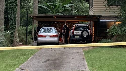 <p>House where a man was shot and killed in DeKalb County</p> <p>DeKalb Police officers wait inside carport on Northlake Trail or homicide detectives have been called to investigate shooting&nbsp;</p>