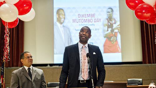 Dikembe Mutombo (center) speaks during the celebration naming September 1 as Dikembe Mutombo Day in Fulton County at the Fulton County Government Center in Atlanta on Tuesday, September 1, 2015. JONATHAN PHILLIPS / SPECIAL