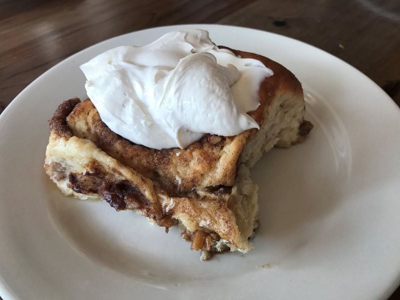 Radial Cafe’s house-made cinnamon roll is the ultimate breakfast treat. LIGAYA FIGUERAS / LFIGUERAS@AJC.COM