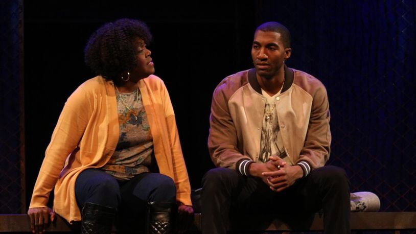 Theresa Hightower and Garrett Turner play a mother and son in “Holler if Ya Hear Me,” a musical inspired by rapper Tupac Shakur and directed by Kenny Leon at True Colors Theatre. CONTRIBUTED BY BILL RANSOM AND CAREY WILLIAMS