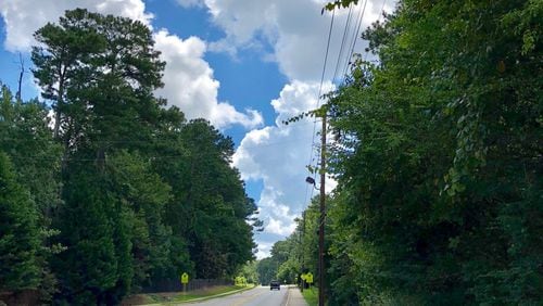 Salpi Adrouny submitted this photo she called “A Perfect Summer Day in Alpharetta.” She wrote, “I was driving home from church on Sunday and noted the glory of the puffy clouds against a blue sky and lovely greenery on Webb Bridge Road simple things we take for granted.”