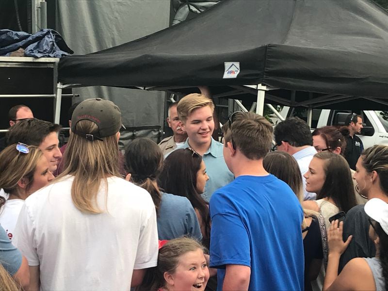  Caleb Lee Hutchinson wades into the crowd after his concert in downtown Dallas. CREDIT: Rodney Ho/rho@ajc.com