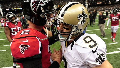 NEW ORLEANS, LA - SEPTEMBER 08: Matt Ryan #2 of the Atlanta Falcons and Drew Brees #9 of the New Orleans Saints speak following a game at the Mercedes-Benz Superdome on September 8, 2013 in New Orleans, Louisiana. The Saints defeated the Atlanta Falcons 23-17. (Photo by Stacy Revere/Getty Images)