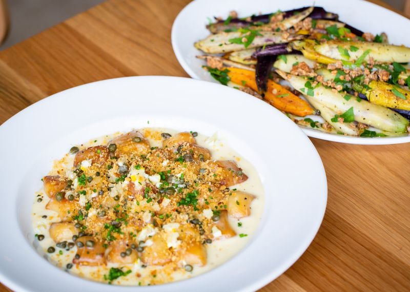 Adele's gnocchi (front) and charred heirloom carrots (back). Ryan Fleisher for The Atlanta Journal-Constitution