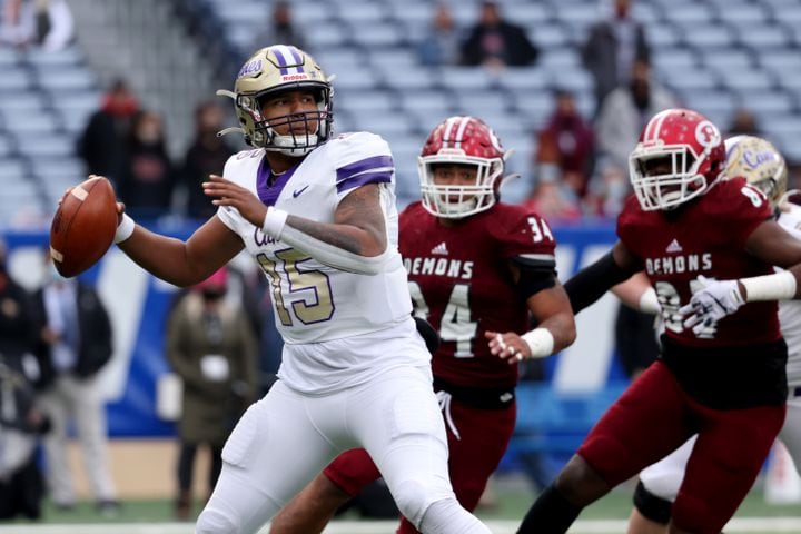 Cartersville quarterback Carlos Del Rio-Wilson (15) attempts a pass in the first half against Warner Robins in the Class 5A state high school football final at Center Parc Stadium Wednesday, December 30, 2020 in Atlanta. JASON GETZ FOR THE ATLANTA JOURNAL-CONSTITUTION