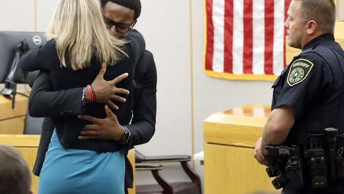 Botham Jean’s younger brother Brandt Jean asked the judge if he could give convicted murderer Amber Guyger a hug after delivering his impact statement at the Frank Crowley Courts Building in Dallas, Texas, on Oct. 2, 2019. The fired Dallas police officer was found guilty of murder by a 12-person jury. TOM FOX / THE DALLAS MORNING NEWS / POOL / TNS