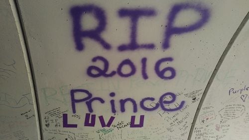 A message to Prince on the Riley Creek underpass in front of Paisley Park. Photo: Melissa Ruggieri/AJC