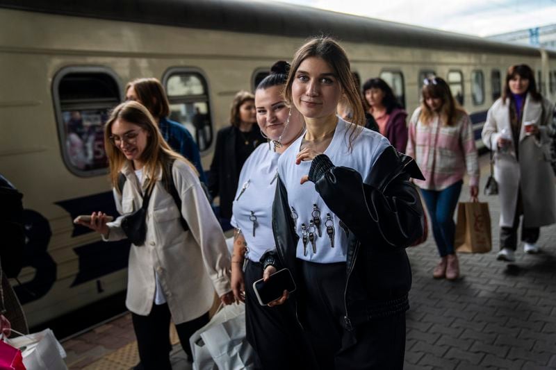 Ukrainian singers Jerry Heil, right, and rapper alyona alyona arrive to catch a train at the main station, in Kyiv, Ukraine, Thursday, April 25, 2024. Ukraine’s entrants in the pan-continental music competition, the female duo of rapper alyona alyona and singer Jerry Heil set off from Kyiv for the competition on Thursday. In wartime, that means a long train journey to Poland, from where they will travel on to next month’s competition in Malmö, Sweden. (AP Photo/Francisco Seco)