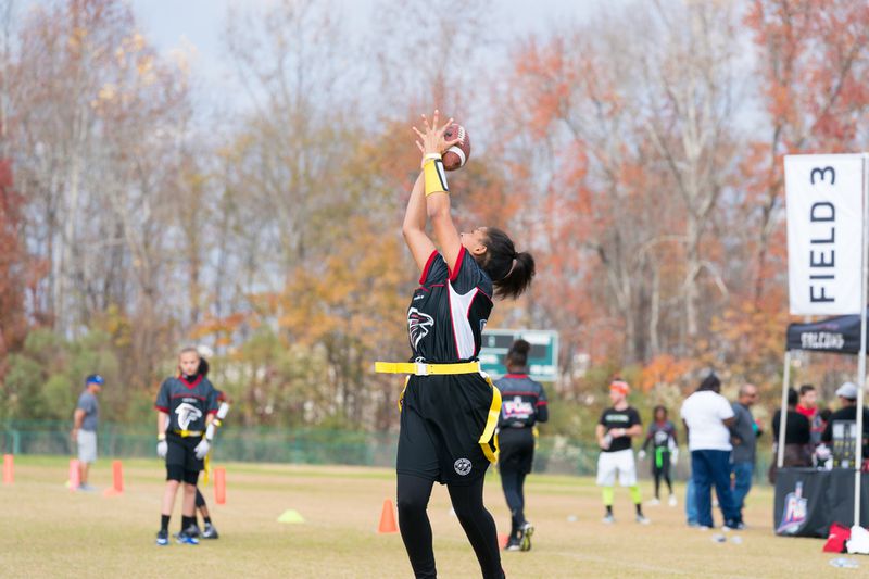 Girls in this NFL camp are playing flag football. In a program starting this fall, all 20 Gwinnett County public high schools will have girls flag football teams that will compete against each other in a five-game series. Courtesy of The Arthur M. Blank Family Foundation