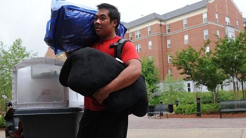 UGA is asking older students to forgo their dorm rooms for freshmen and offering them cash to do so. (AJC file photo)