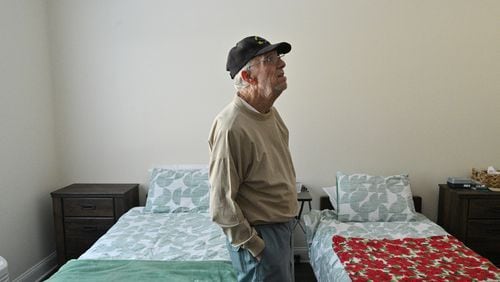 Frank Carroll, former resident at Tranquil Gardens, stands in his new room at Brickmont of Acworth, an Assisted Living and Alzheimer's Care facility. Tranquil Gardens Assisted Living and Memory Care facility in Acworth abruptly announced it was closing its doors, giving the 27 residents and their families less than 72 hours to make other arrangements. (Hyosub Shin / Hyosub.Shin@ajc.com)