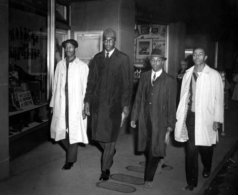 This photographer caught the Greensboro Four walking out of Woolworth’s on the first day of the sit-in. They are (from the left) David Richmond, Franklin McCain, Ezell Blair Jr. (Jibreel Khazan) and Joe McNeil. JACK MOEBES / ITVS