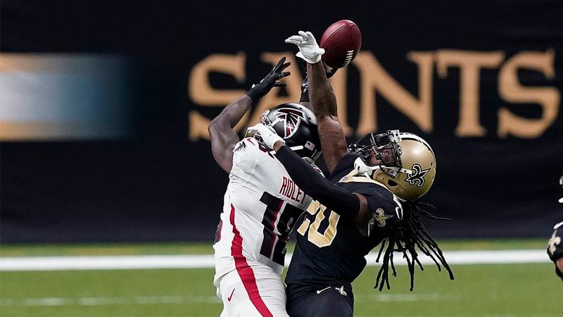 New Orleans cornerback Janoris Jenkins (20) breaks up a pass intended for Atlanta wide receiver Calvin Ridley (18) in the second half Sunday, Nov. 22, 2020, in New Orleans. (Butch Dill/AP)