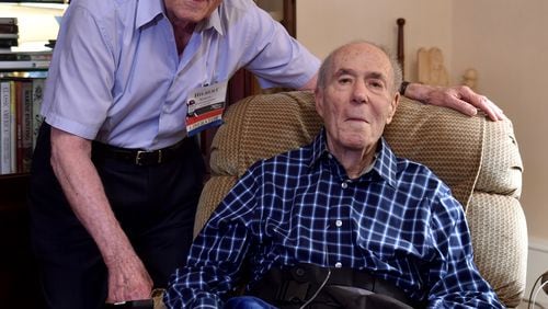 Hilbert Margol, left, and his twin brother Howard served together in WWII.