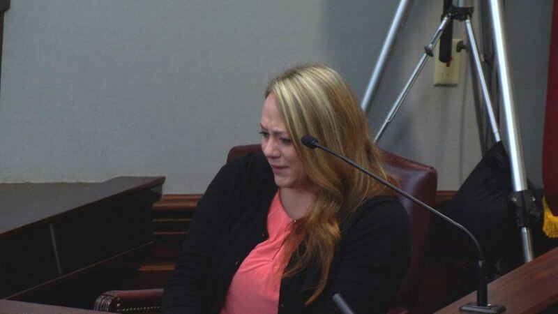 Leanna Taylor, the ex-wife of Justin Ross Harris, breaks down while testifying about how she learned that Cooper had died, during Harris' murder trial at the Glynn County Courthouse in Brunswick, Ga., on Monday, Oct. 31, 2016. (screen capture via WSB-TV)