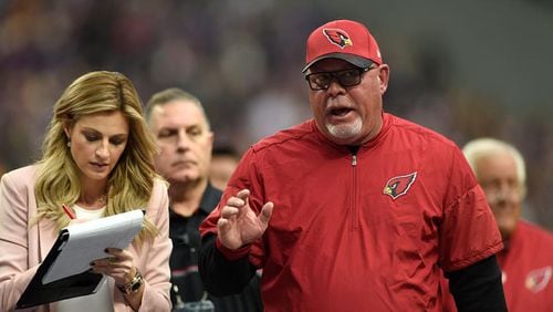 MINNEAPOLIS, MN - NOVEMBER 20: Arizona Cardinals head coach Bruce Arians speaks with Erin Andrews, FOX Sports sideline reporter, after the close of the first half of the game against the Minnesota Vikings on November 20, 2016 at US Bank Stadium in Minneapolis, Minnesota. (Photo by Hannah Foslien/Getty Images)