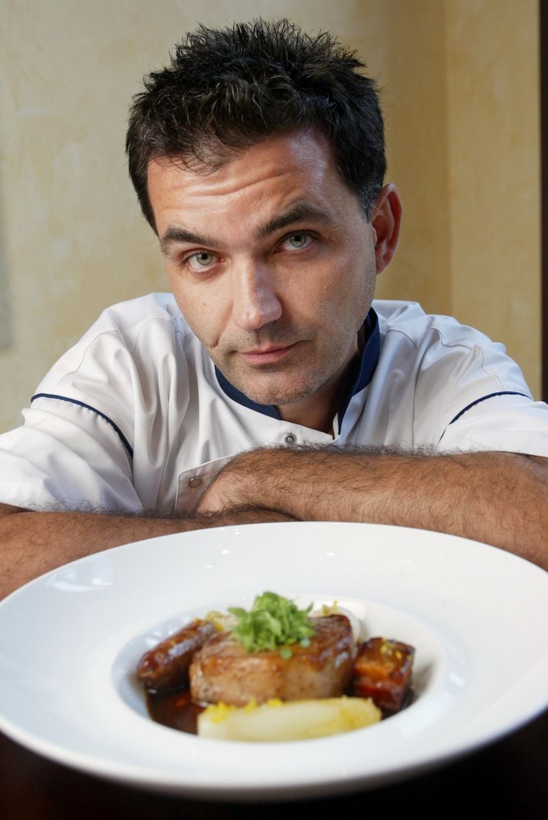 Portrait of Joel Antunes with the Pork Belly Lion with Sage Juice from his Atlanta restaurant.  (PHIL SKINNER/AJC staff)