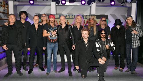 (L-R) Rick Allen, Tommy Lee, Vivian Campbell, Joe Elliott, Bret Michaels, Phil Collen, Rick Savage, Rikki Rockett, C.C. DeVille, Nikki Sixx, Vince Neil, Mick Mars, and Bobby Dall attend the Press Conference with Mötley Crüe, Def Leppard, and Poison announcing 2020 Stadium Tour on December 04, 2019 in Hollywood, California. (Photo by Kevin Winter/Getty Images)