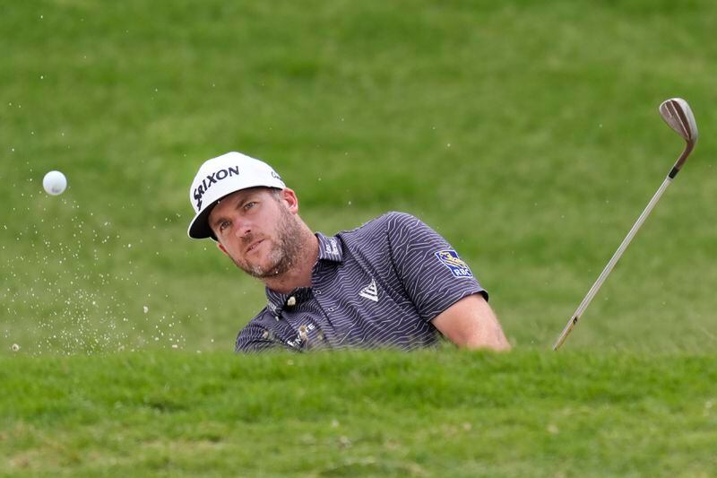 Taylor Pendrith hits from the sand on the sixth green during the final round of the Byron Nelson golf tournament in McKinney, Texas, Sunday, May 5, 2024. (AP Photo/LM Otero)