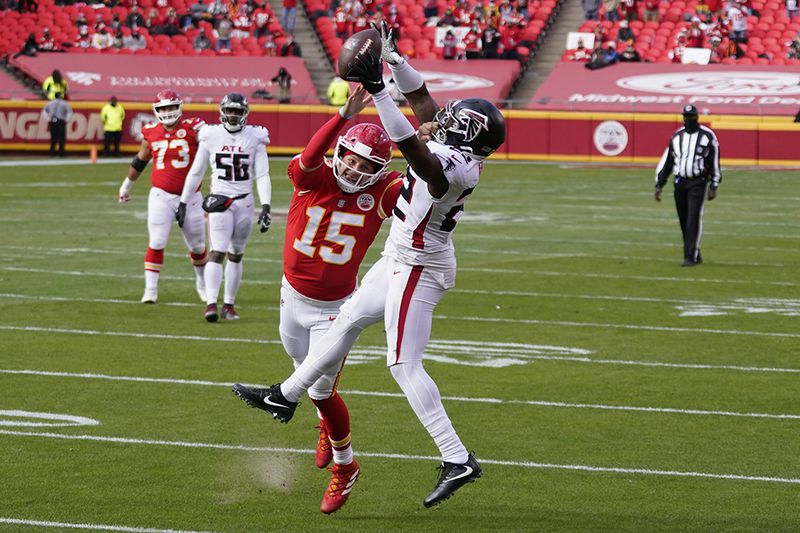 A pass intended for Kansas City Chiefs quarterback Patrick Mahomes is intercepted by Atlanta Falcons safety Keanu Neal during the first half Sunday, Dec. 27, 2020, in Kansas City, Mo. (Jeff Roberson/AP)