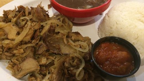 The mojo pork platter is one of the best options at Cuba Mia on Buford Highway. CONTRIBUTED BY WENDELL BROCK