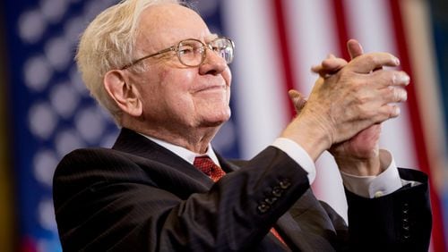 Warren Buffett’s firm, Berkshire Hathaway Inc., now owns substantial stakes in both Coke and Delta. (AP Photo/Andrew Harnik)