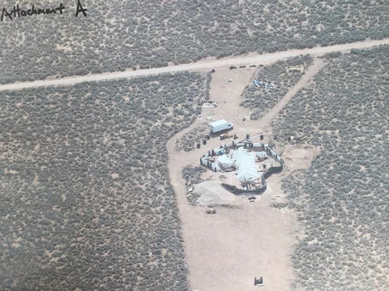 An aerial view of the compound in Amalia, New Mexico where authorities arrested two Metro Atlanta men on Friday in a child abduction case. One of the men, Siraj Wahhaj, is accused of abducting his three-year-old son from Clayton county in December. His son, Abdul-Ghani Wahhaj, was not found at the compound Friday, but investigators believe he had been there in the past few weeks. Source: Taos County Sheriff’s Office