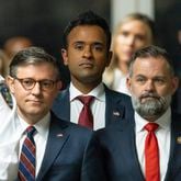 From left U.S. House Speaker Mike Johnson, businessman Vivek Ramaswamy and Republican U.S. Rep. Cory Mills of Florida listen as former President Donald Trump talks to reporters outside a Manhattan criminal court before his trial resumed Tuesday. (Justin Lane/Pool Photo via AP)