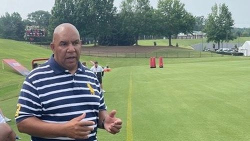 Former Falcons wide receiver coach George Stewart was at practice on Friday in his new role with the league office. (By D. Orlando Ledbetter/dledbetter@ajc.com)