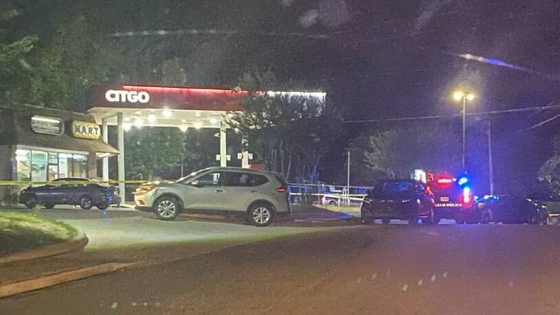 A suspect has been arrested and is facing a murder charge in connection with a gas station shooting in DeKalb County last week, police said Tuesday.
