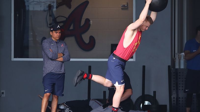 Injured Braves pitcher Mike Soroka, recovering from a Achilles tendon tear,, works on strength and condition in the team's training facility during spring training on Wednesday, March 16, 2022, in North Port.    “Curtis Compton / Curtis.Compton@ajc.com”