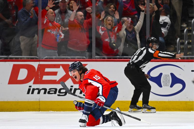 Washington Capitals left wing Sonny Milano (15) celebrates his first goal during the first period of an NHL hockey game against the Tampa Bay Lightning, Saturday, April 13, 2024, in Washington. (AP Photo/John McDonnell)