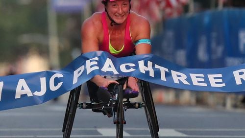 July 04, 2017 Atlanta: Tatyana McFadden hits the finish line to win the women’s wheelchair race in her seventh win in 2017 at The Atlanta Journal-Constitution Peachtree Road Race. Last year she came in second, but this year she will race again. Curtis Compton/ccompton@ajc.com