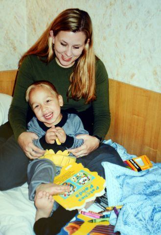A Decatur couple journeys through Russia to adopt a charismatic little boy born with dwarfism.